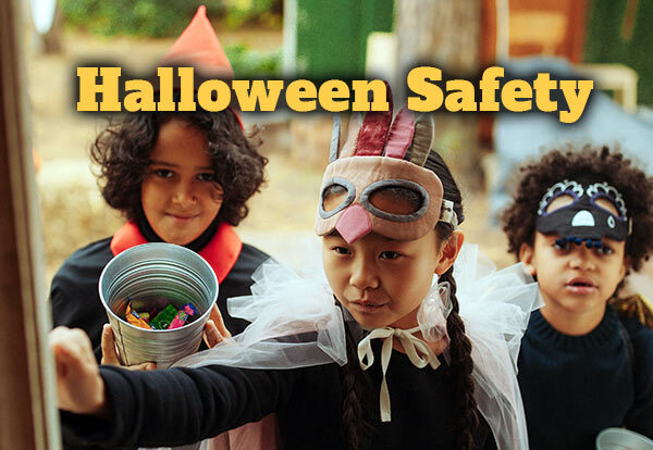 Three trick or teaters ringing a doorbell with the text, Halloween Safety