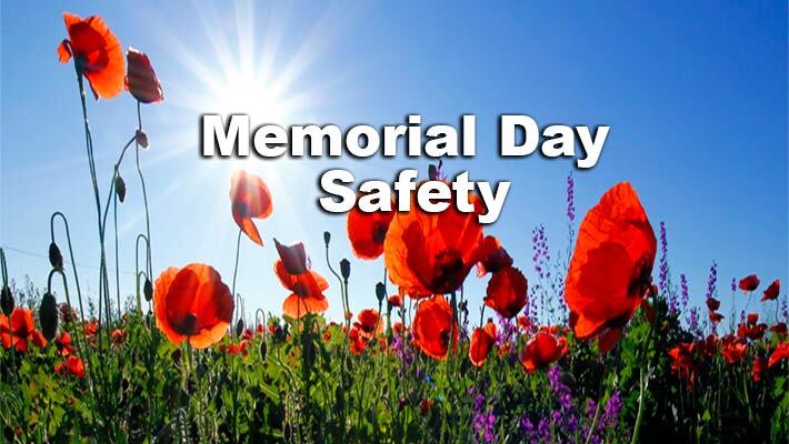 Memorial Day Safety. A field of flowers is in the background.